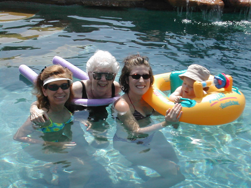 Family spending time together in the pool