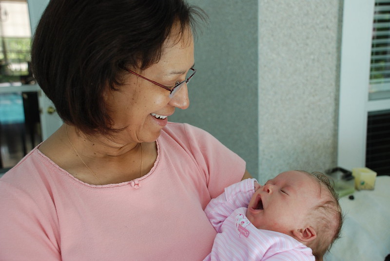 Grandma holding a grandchild