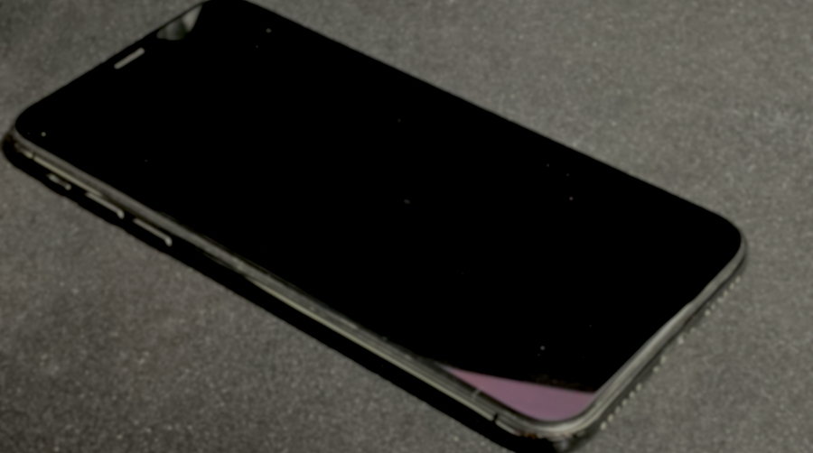 Cellphone face up on a desk