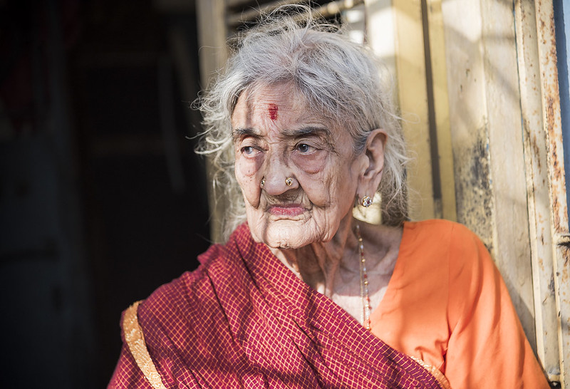 Elderly woman in traditional dress