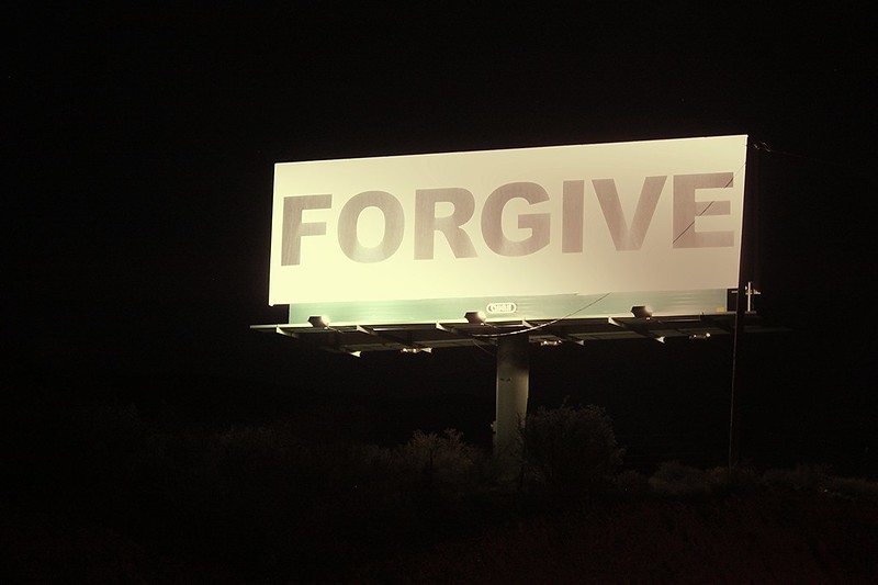 "Forgive" on a billboard