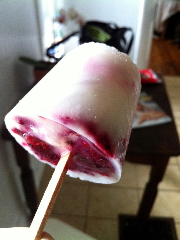 Lemon buttermilk popsicle with frozen berries