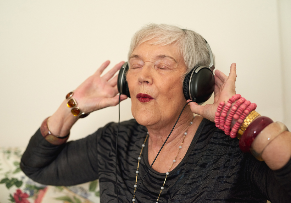 Grandma rocking out with headphones on