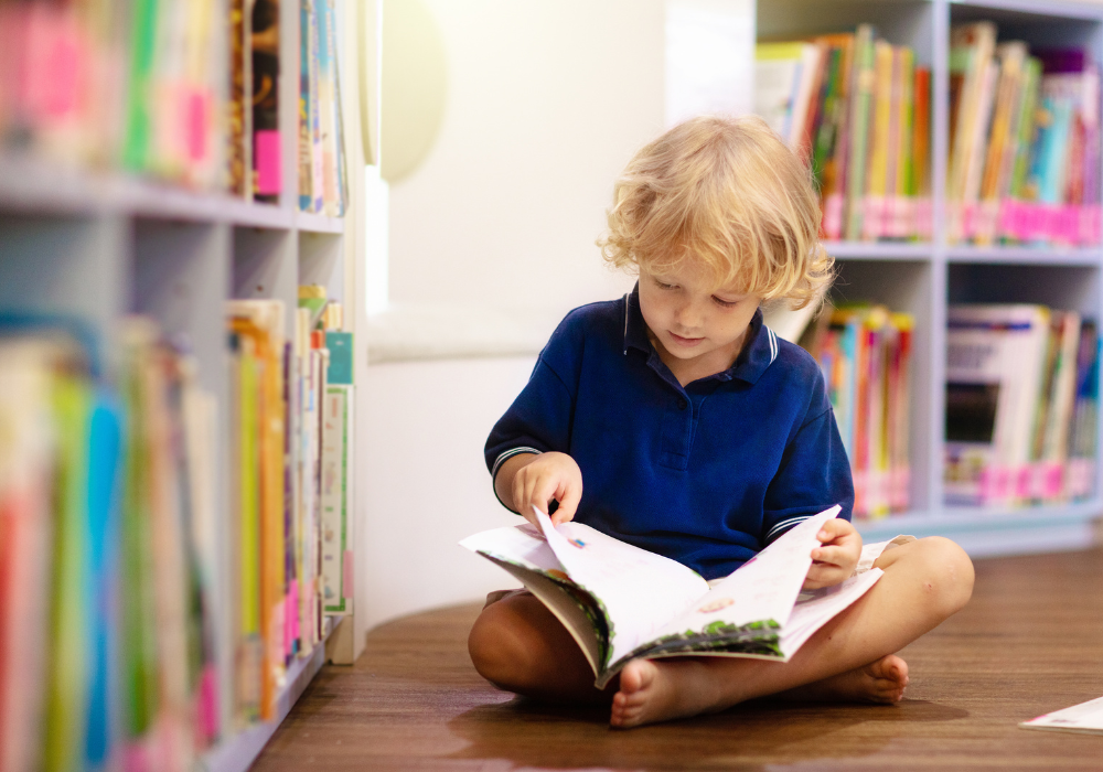 Child looking through a book
