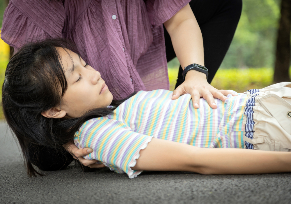 Taking care of child having a seizure