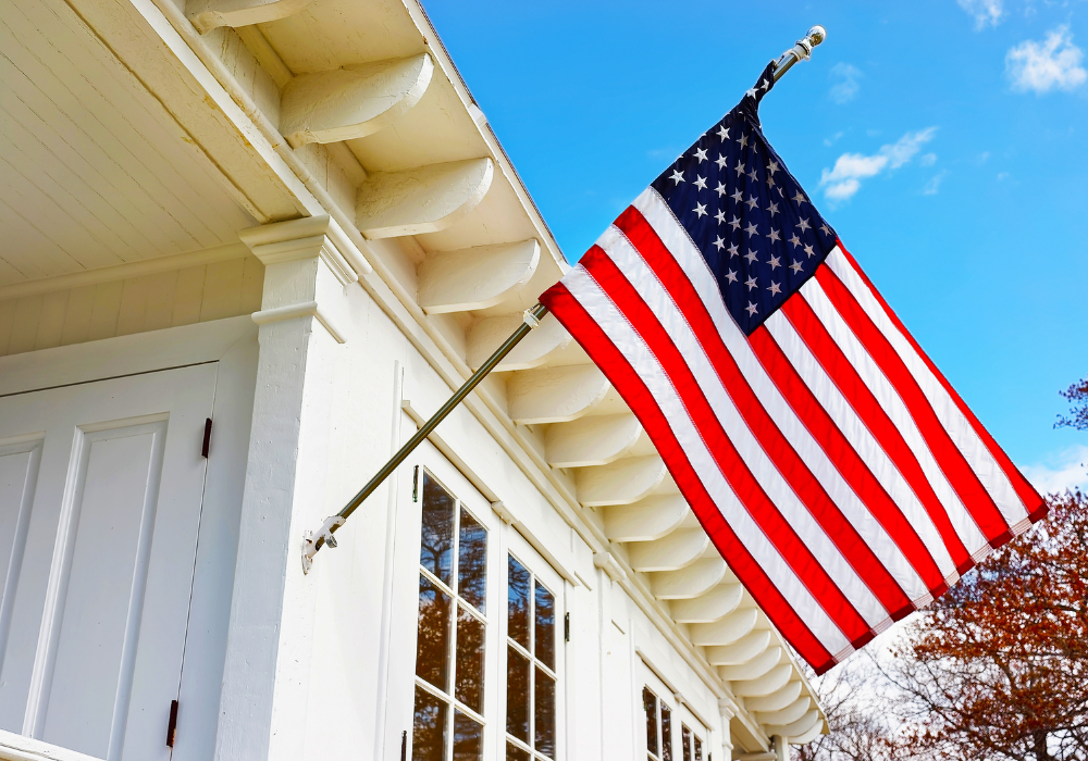 American flag flying outside of a home