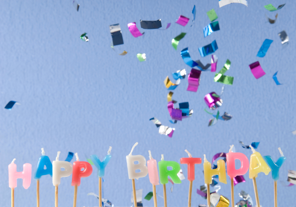 Happy Birthday candles and confetti