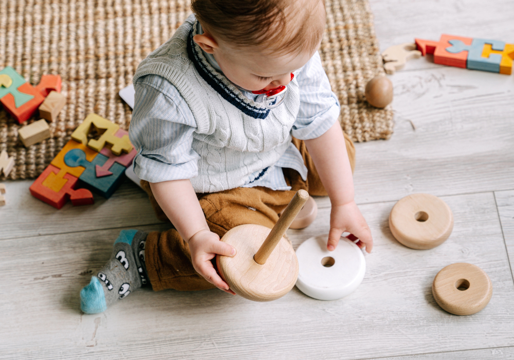 Baby playing with ring toy