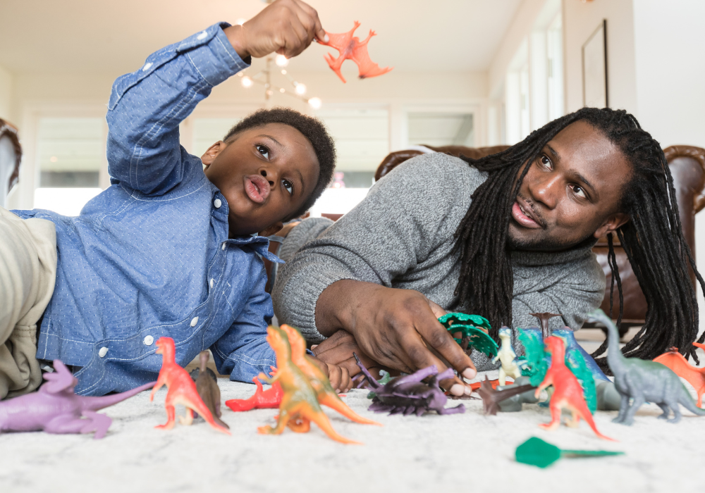 Playing with dinosaur toys