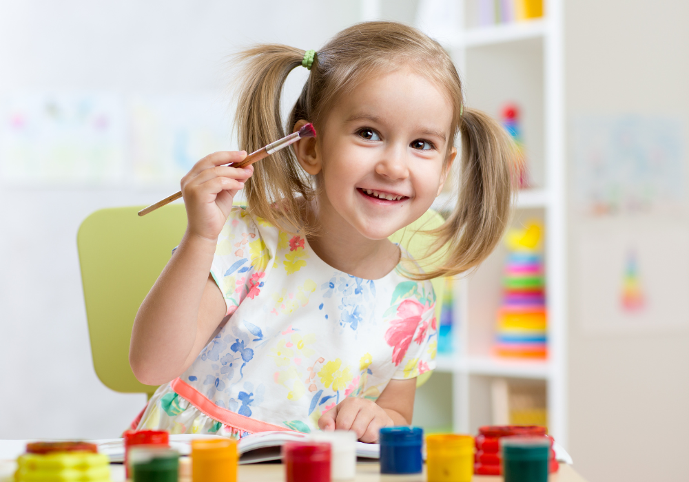 Child making a painting