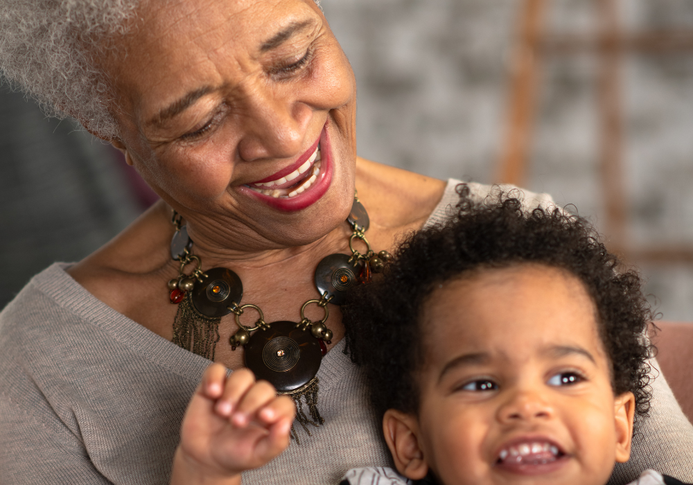 Grandmother and grandson smiling